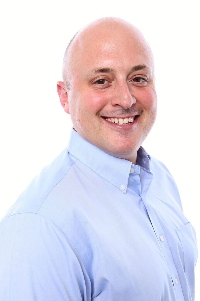 Adam Monago Color Headshot Adam Monago Color Headshot